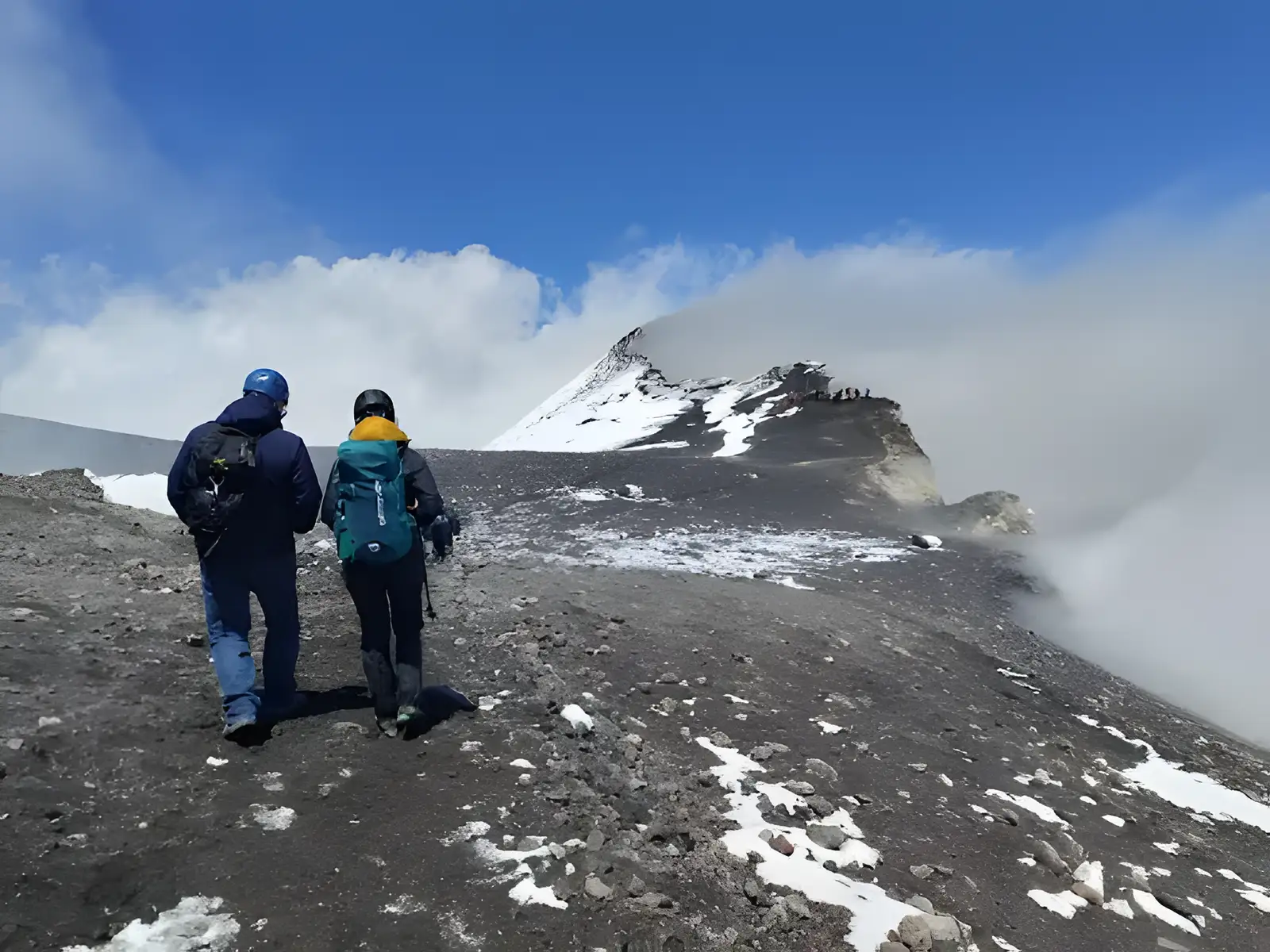 A day pack with water, hat and layers ready for a Mount Etna excursion