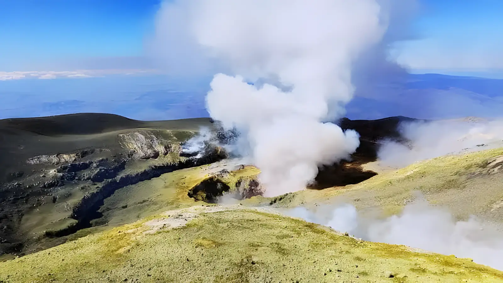 Hikers with a certified guide near the summit craters of Mount Etna